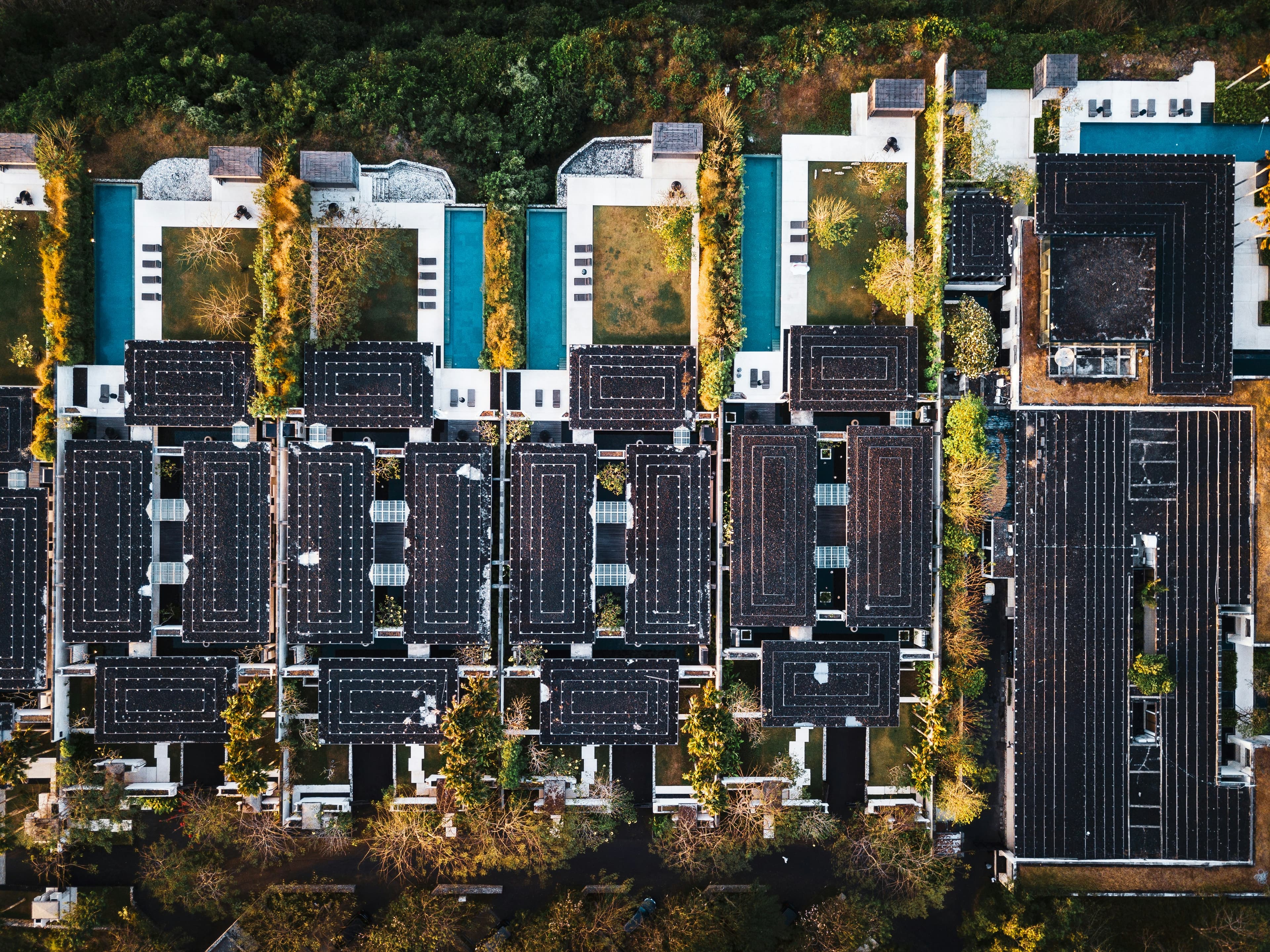 Modern apartment building with solar panels on the rooftop