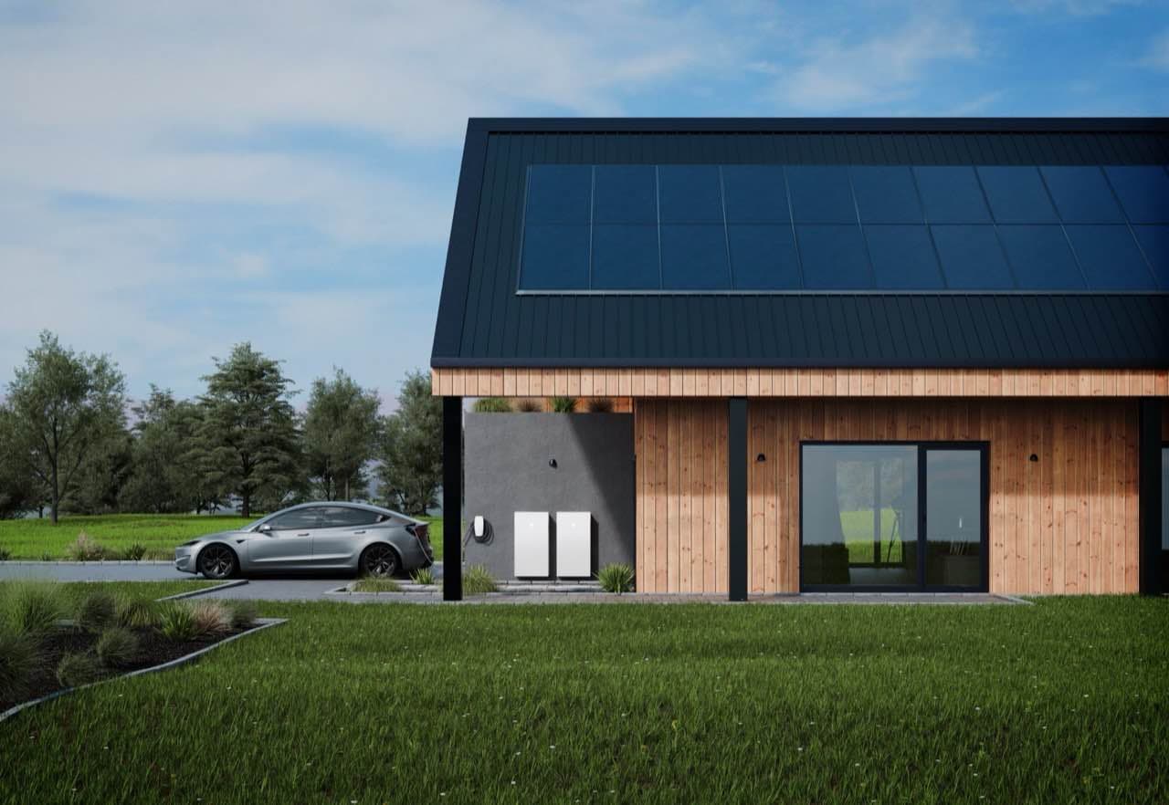 Modern home with Tesla Powerwall batteries and electric vehicle charging